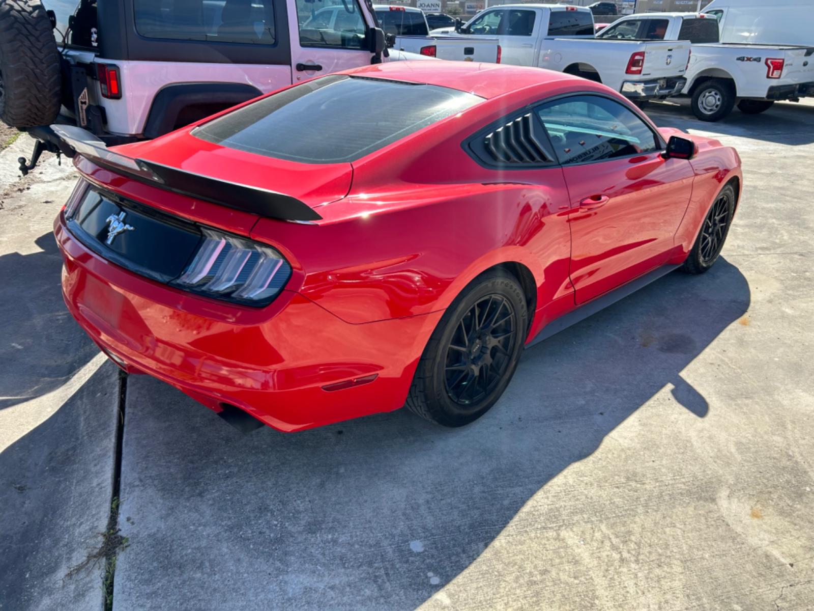 2015 Red Ford Mustang (1FA6P8AM2F5) with an 6 Cy engine, 5Spd transmission, located at 1687 Business 35 S, New Braunfels, TX, 78130, (830) 625-7159, 29.655487, -98.051491 - Photo #3